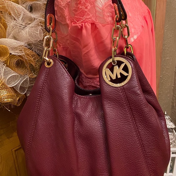 Michael Kors Handbags - Burgundy colored leather Michael Kors Bag gold hardware